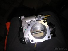 škrtící klapka Octavia 1 - 2