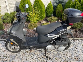 Skutr 125 ccm nova stk najeto 14800 km - 2