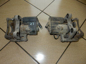 Levý zadní brzdový třmen VW Passat B6 - 2