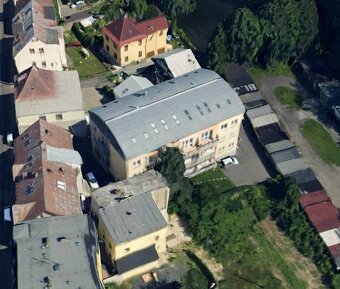 Spoluvlastnický podíl o velikosti 2148/144293 na pozemku v L - 2
