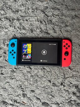 Nintendo Switch V1 Neon + dock + Mario Odyssey - 2