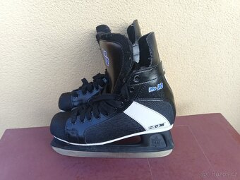 Dětské brusle CCM -vel 42-26 cm. - 2