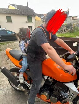 Postroj pro dětského spolujezdce. - 2