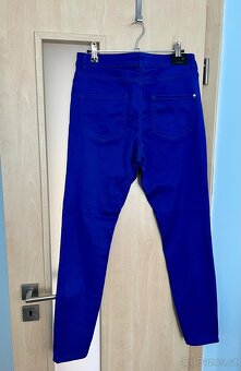 Dám. modré skinny fit kalhoty Orsay, vel. 38, sleva 599 Kč. - 2