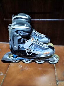Prodám pěkné zánovní kolečkové brusle HY SKATE v.40 - 2