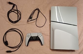 PS5 Slim s mechanikou v záruce do 7.8.2026 - 2