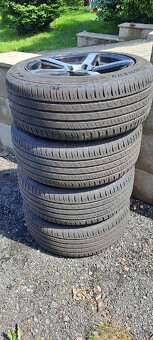 Pneu na alu. diskách 215/55 R 17 - 2