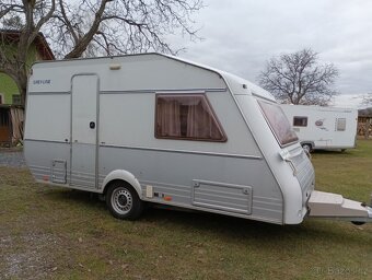 KIP č.147 Rok 2001. Pro 3 osoby. 12V+baterie. 960kg.100km/h - 2