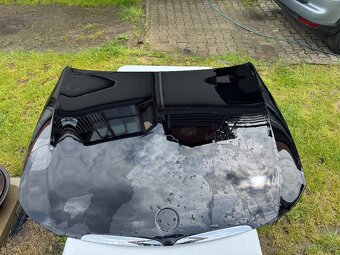 Kapota a levý blatník BMW e90 - 2