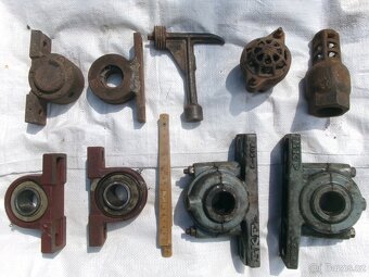 prodám různé hřídele, železné a dřevěné kolečka..... Železné - 2