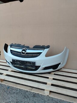 Přední nárazník Opel Corsa D rv 2010 - 2