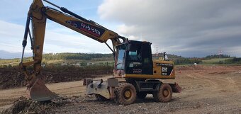 Kolový bagr Cat 315D - 2