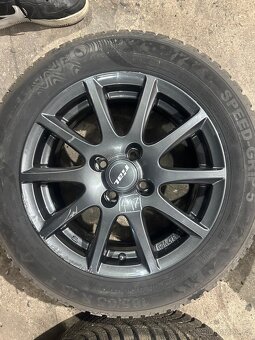 417. Kola na Mazda 2 - 2