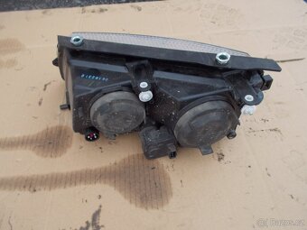 Světlo PP VW Passat B5 H7+H1 - 2