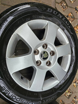 ALU kola letní Orion Škoda 5x112 Octavia II R15 ET47 - 2