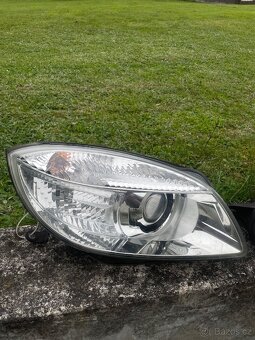 Přední světla Škoda Fabia II / Škoda Roomster Hella - 2