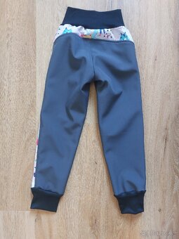Softshellove kalhoty 104/110 nové - 2