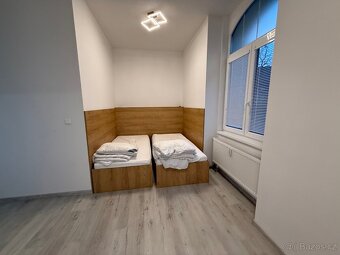 Pronájem nově zrekonstruovaného bytu 1kk v rezidenční vile s - 2