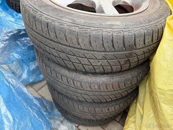 Dezent letní 175/65 r14 4x100 - 2