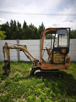 Komatsu PC12R váha 1500kg - 2