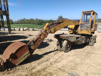 Kolový bagr DH 113 - 2