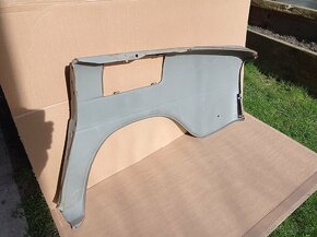 Zadní pravý blatník Škoda 100. - 2