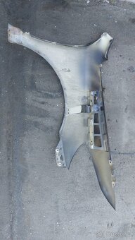 Škoda octavia II facelift levý blatník - 2