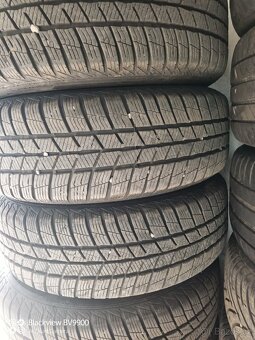 Zimní pneumatiky 195/65 R15 na disku VW 5x100. - 2