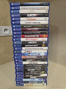 PS 4 PRO 1 TB + 28 her - 2