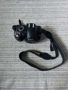 Nikon D3100 + 18-55, 55-200 - 2
