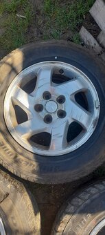 Alu disky mazda tribute - 2