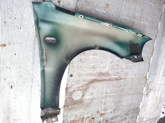 PŘEDNÍ BLATNÍK VW PASSAT B5,5 - 2