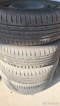 Sada plechových kol Peugeot 306 185/65 R14 - 2