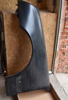 Přední blatník Mercedes w210 - 2