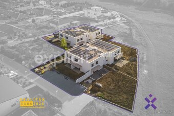 Prodej novostaveb mezonetových bytů 3+kk 79 m², zahrada 73 - - 2