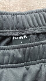 Chlapecké značkové tepláky. - 2