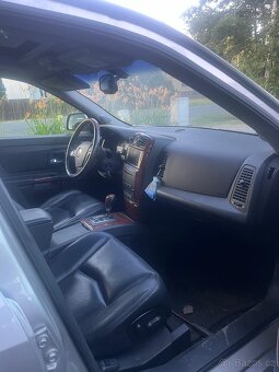 Cadillac SRX 3,6 r.v.2004 - 2
