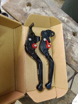 Prodám výkyvné CNC páky na Suzuki - 2