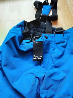 Modré lyžařské kalhoty vel. 134-140 - 2