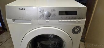 Pračka AEG Lavamat L76475 na 9 kg prádla 1400 ot. - 2