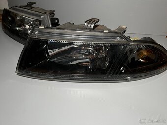Světla- mitsubishi carisma - 2