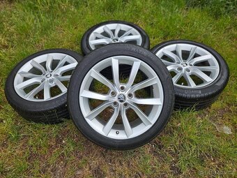 Kompletní letní Alu kola Škoda MODUS - 235/45 R18 - 5x112 - 2