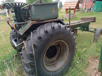 RS09 GT 124 traktor - 2