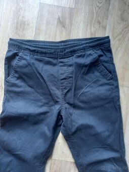 Plátěné kalhoty 146 - 2