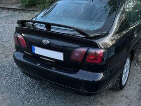Zadní spoileru Nissan Primera P11 Liftback - 2