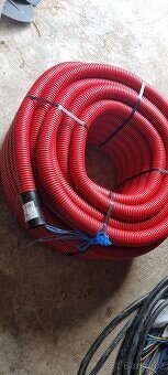 Zemnící pásovina 25 kg a vrapovaná chránička 50 mm 100m - 2