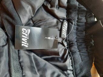 Černé lyžařské kalhoty vel. 134-140 - 2