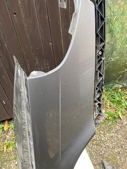 Přední blatníky Saab 9-5 2004 - 2