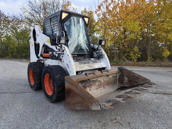 Šmykem rizený nakladač Bobcat S185. ŠPZ. - 2