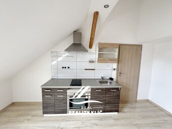 Pronájem mezonetového bytu 2+kk, 55m2, ul. U Hřiště , Ost - 2